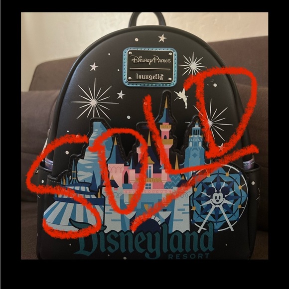 Loungefly Handbags - NWT Loungefly Disneyland Blue Backpack